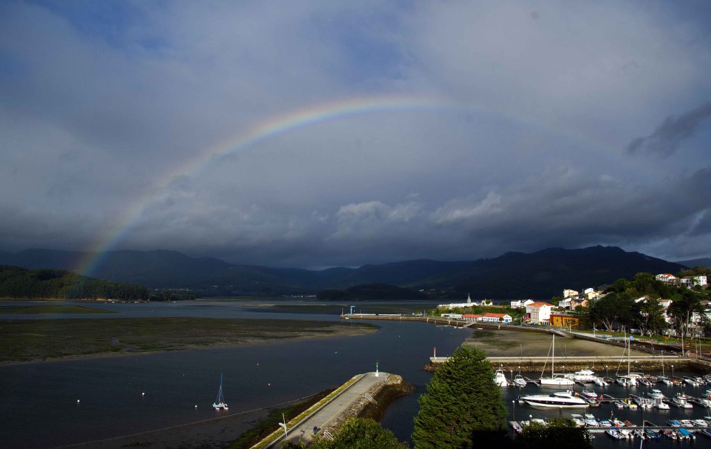 Rainbow above the Ria Ortigueira, Galicia, Spain.