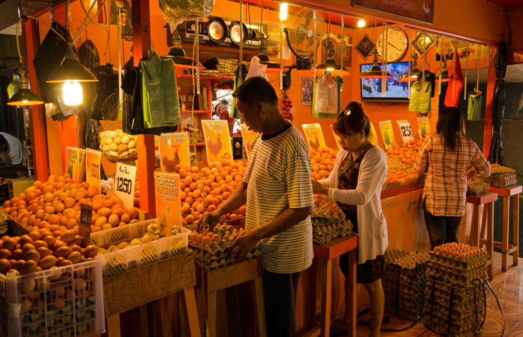 Stall selling eggs in a wide range of size and price categories, Manado, Sulawesi.