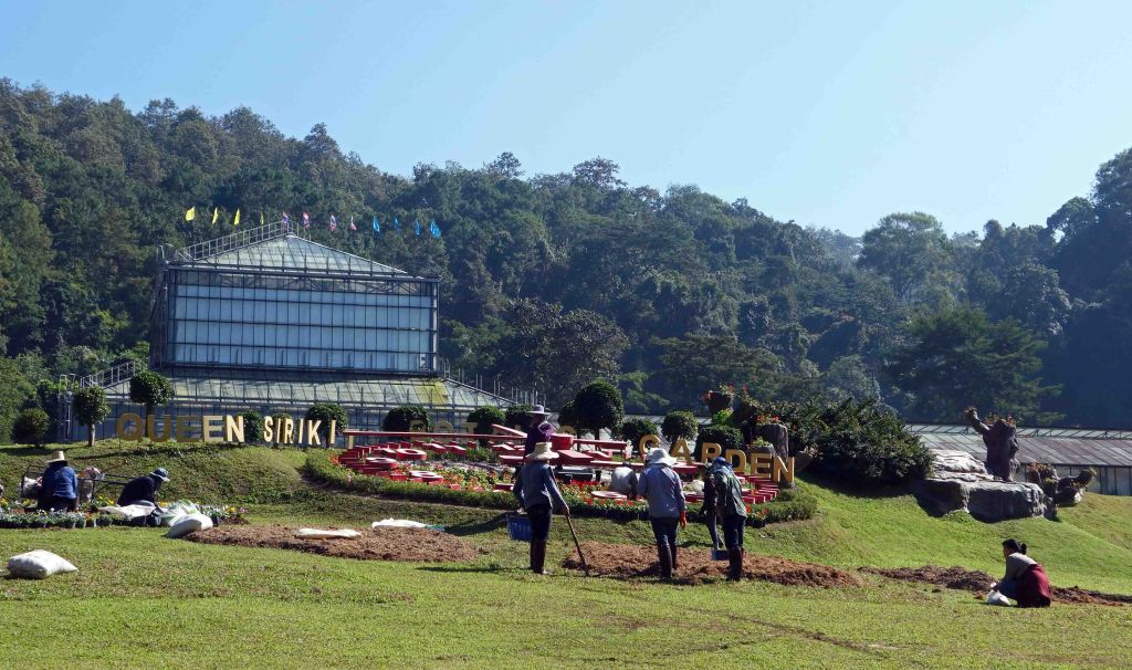 Gardeners working at the Queen Sirikit Botanic Garden