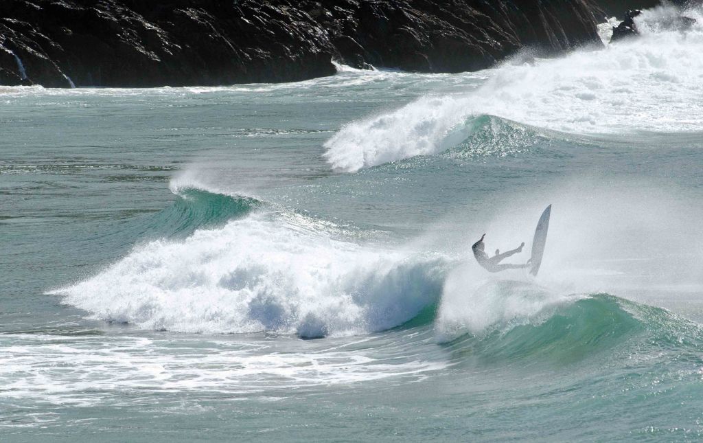 Surfing at Esterio beach, Galicia, Spain