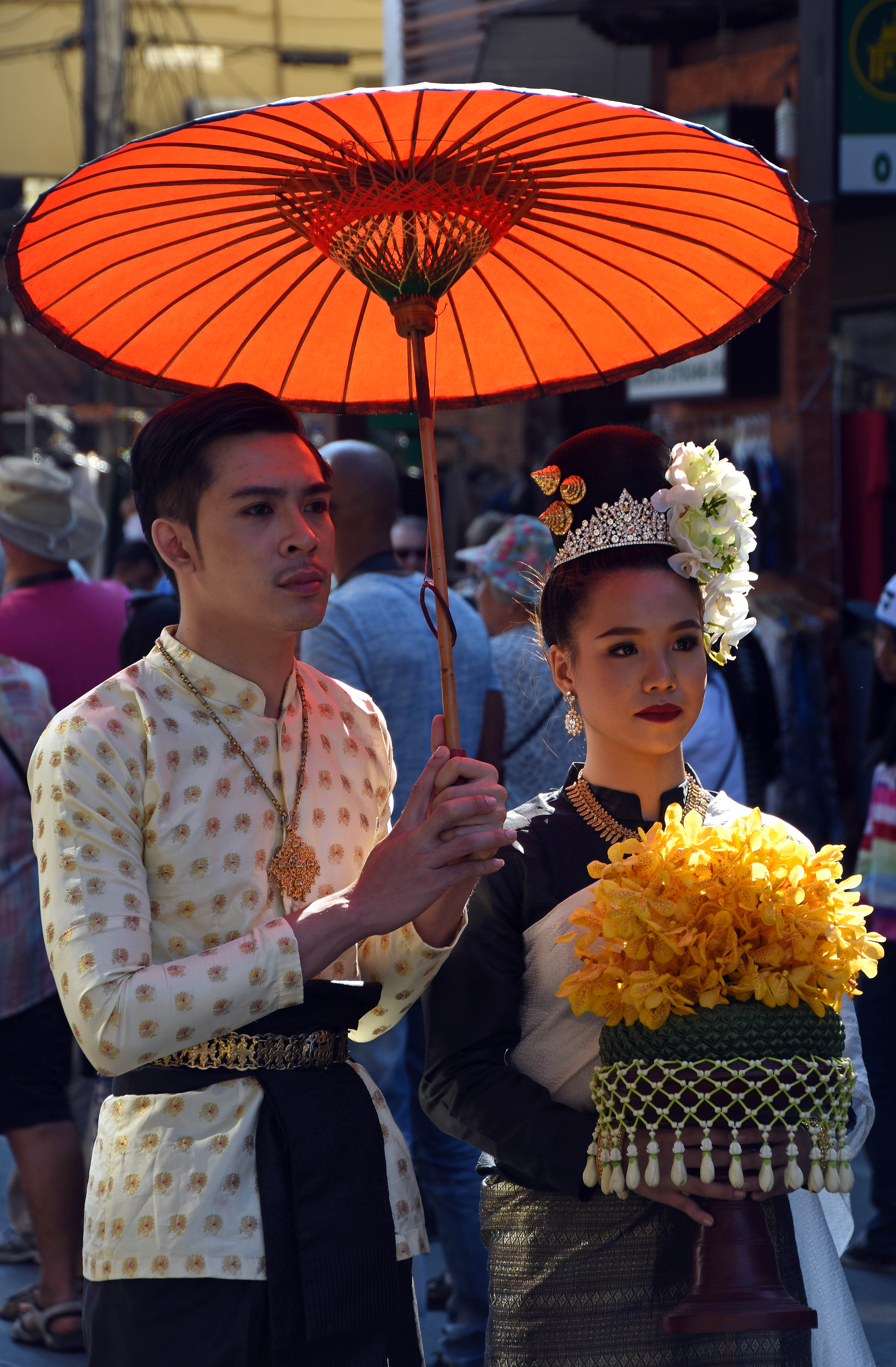 Orange umbrella couple
